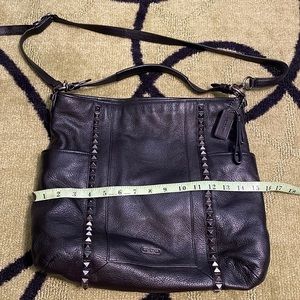 Coach “Park Pyramid Stud Leather Hobo” bag